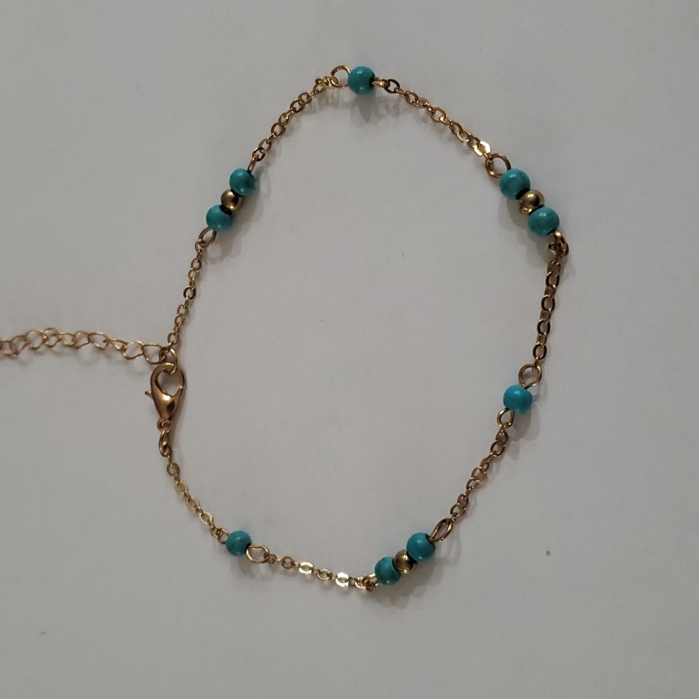 Turquoise like stone and gold bracelet